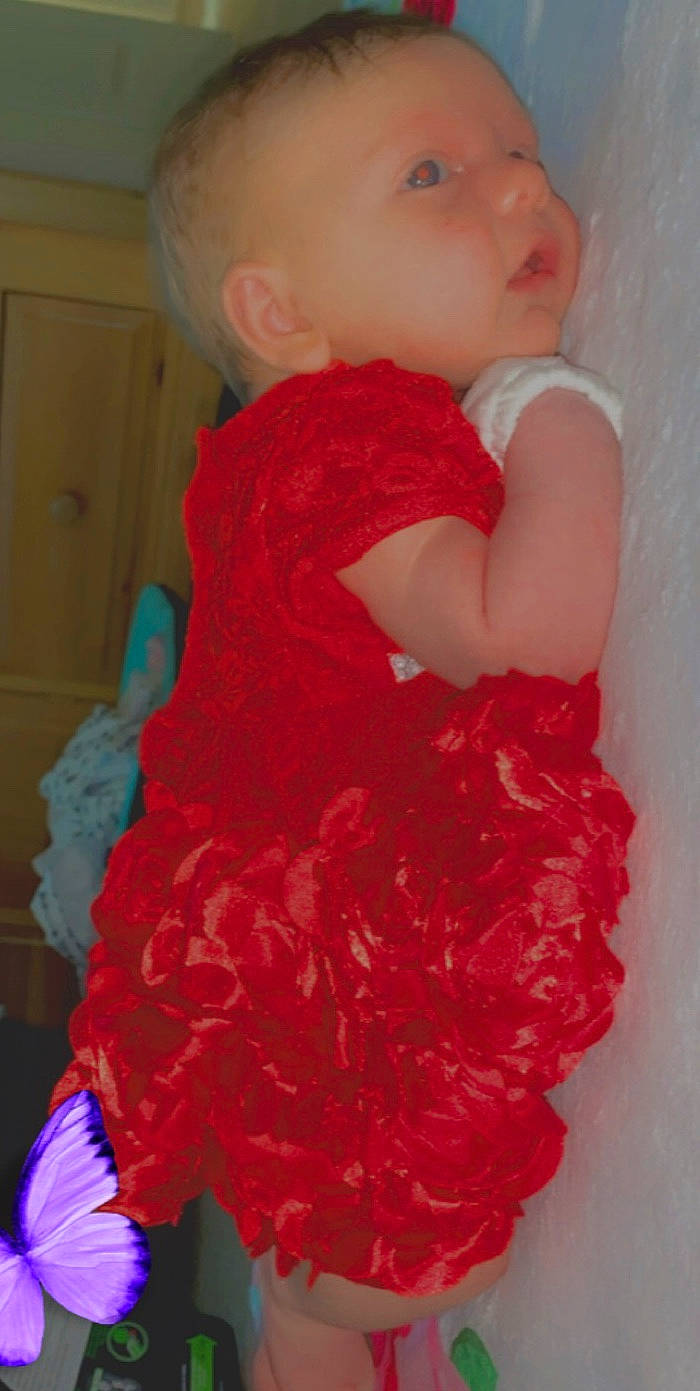 Emma Rose is registered to the contest to win money with this photo: cheek, child, costume, dress, fur, magenta, outerwear, person, pink, red, ruffle, textile, toddler