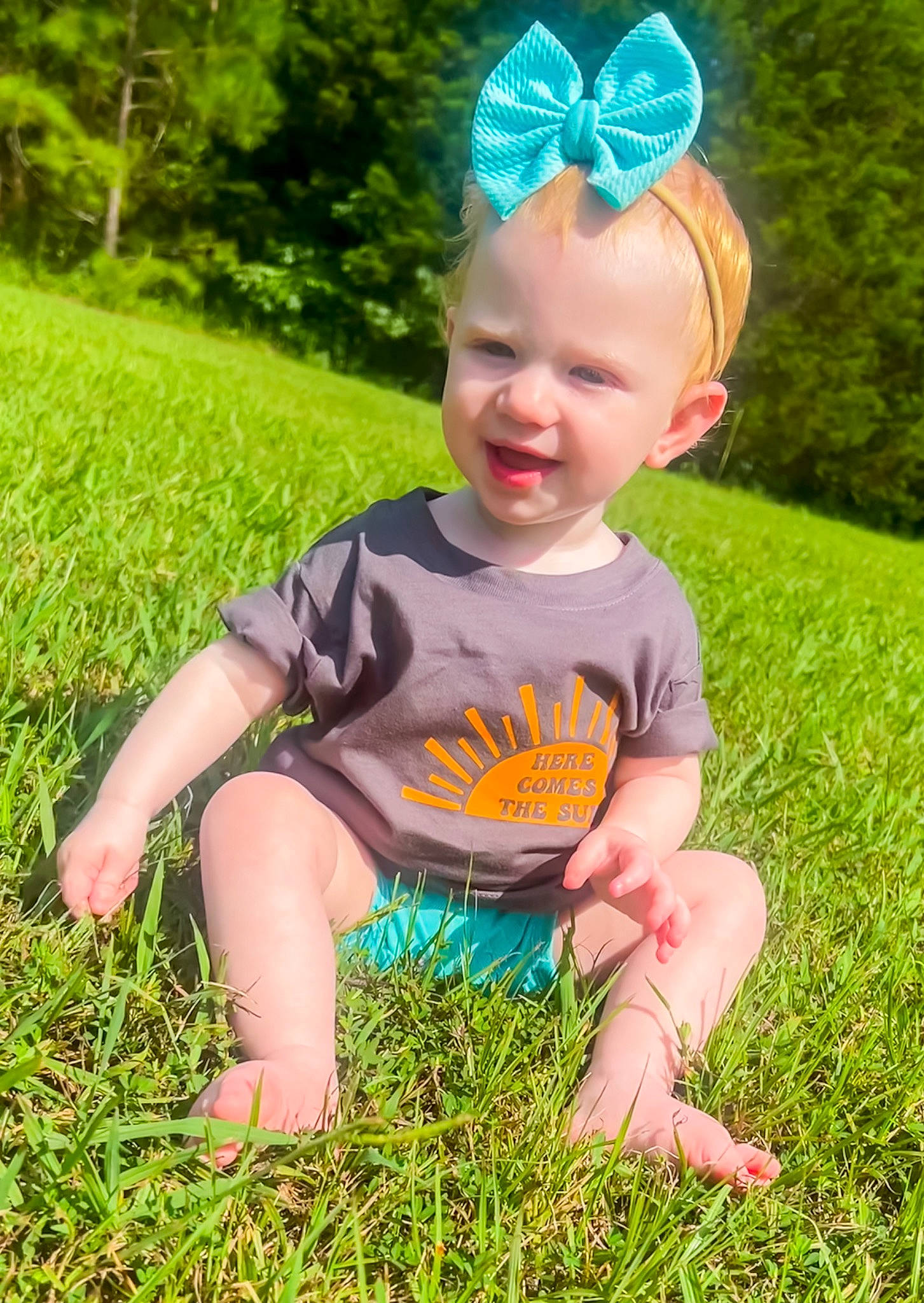 Kaydence joined the competition — help win amazing prizes! baby, baby_toddler_clothing, blue, costume_hat, fun, grass, grassland, green, groundcover, happy, joy, leaf, light, meadow, people_in_nature, person, pink, plant, smile, summer