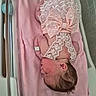 Keeley joined the competition — help win amazing prizes! newborn, baby, sleeping, hospital, bassinet, pink_blanket, lace, bow, infant, head, skin, person, cute, delicate, hospital_band, resting, small, peaceful, clothing, baby_girl