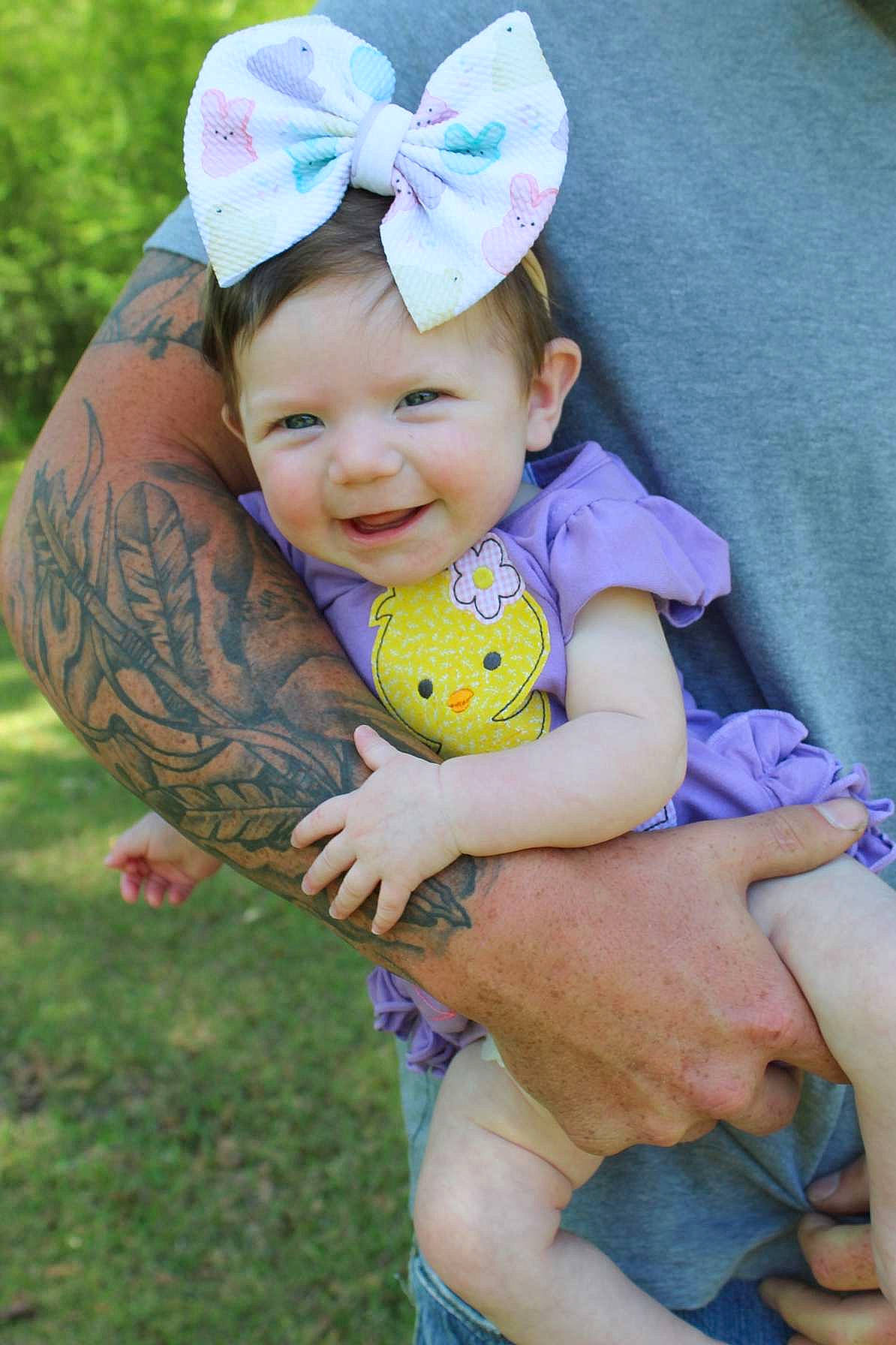 Brynnlee joined the competition — help win amazing prizes! baby, baby_toddler_clothing, cap, child, eye, fun, grass, hand, happy, hat, joy, leg, leisure, people_in_nature, person, pink, plant, skin, smile, sun_hat