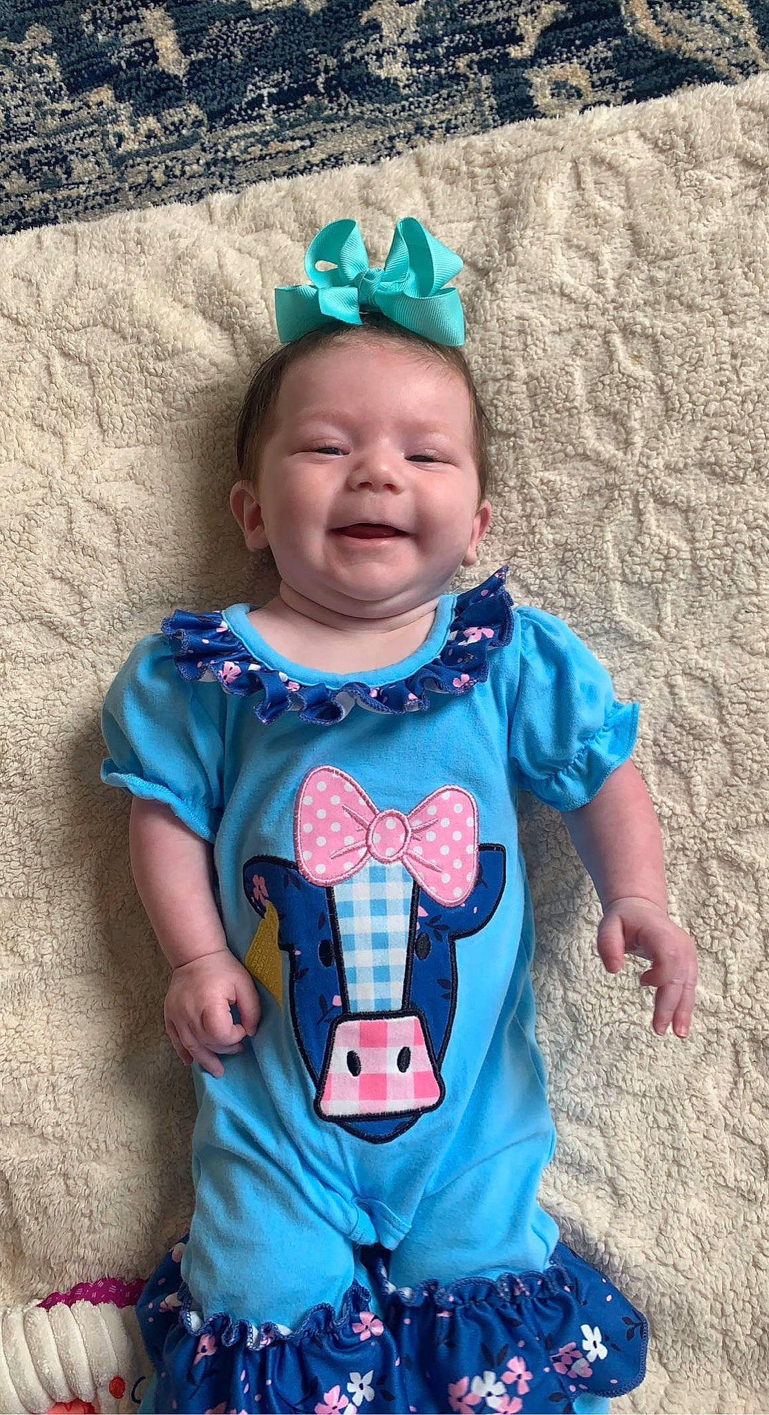 Brynnlee is registered to the contest to win money with this photo: azure, baby, baby_toddler_clothing, blue, cheek, dress, face, green, happy, head, human_body, organ, outerwear, person, pink, skin, sleeve, smile, standing, textile