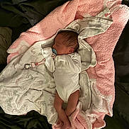 Aniyah is registered to the contest to win money with this photo: baby, bed, blanket, child, clothing, cozy, cute, indoors, infant, newborn, pacifier, peaceful, person, pink_blanket, resting, sleep, sleeping, soft_texture, white_blanket, wrapped