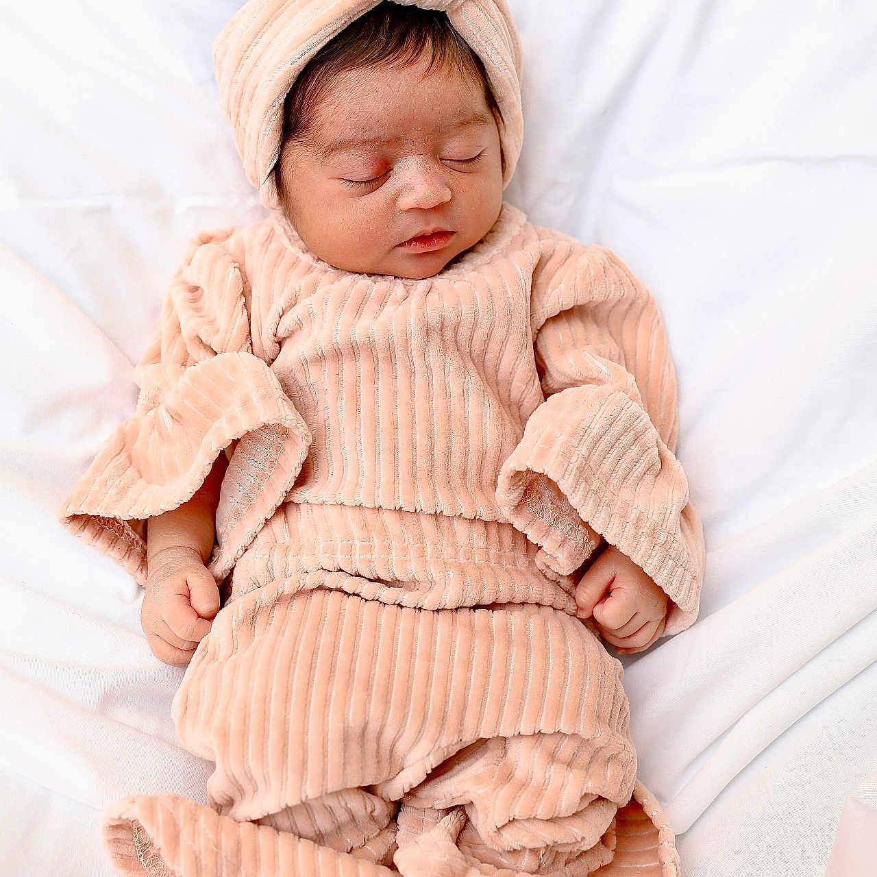 Eimy is registered to the contest to win money with this photo: baby, blanket, bonnet, cap, clothing, face, happy, hat, head, hood, hoodie, knitwear, newborn, person, photography, portrait, sleeping, smile, sweater, sweatshirt