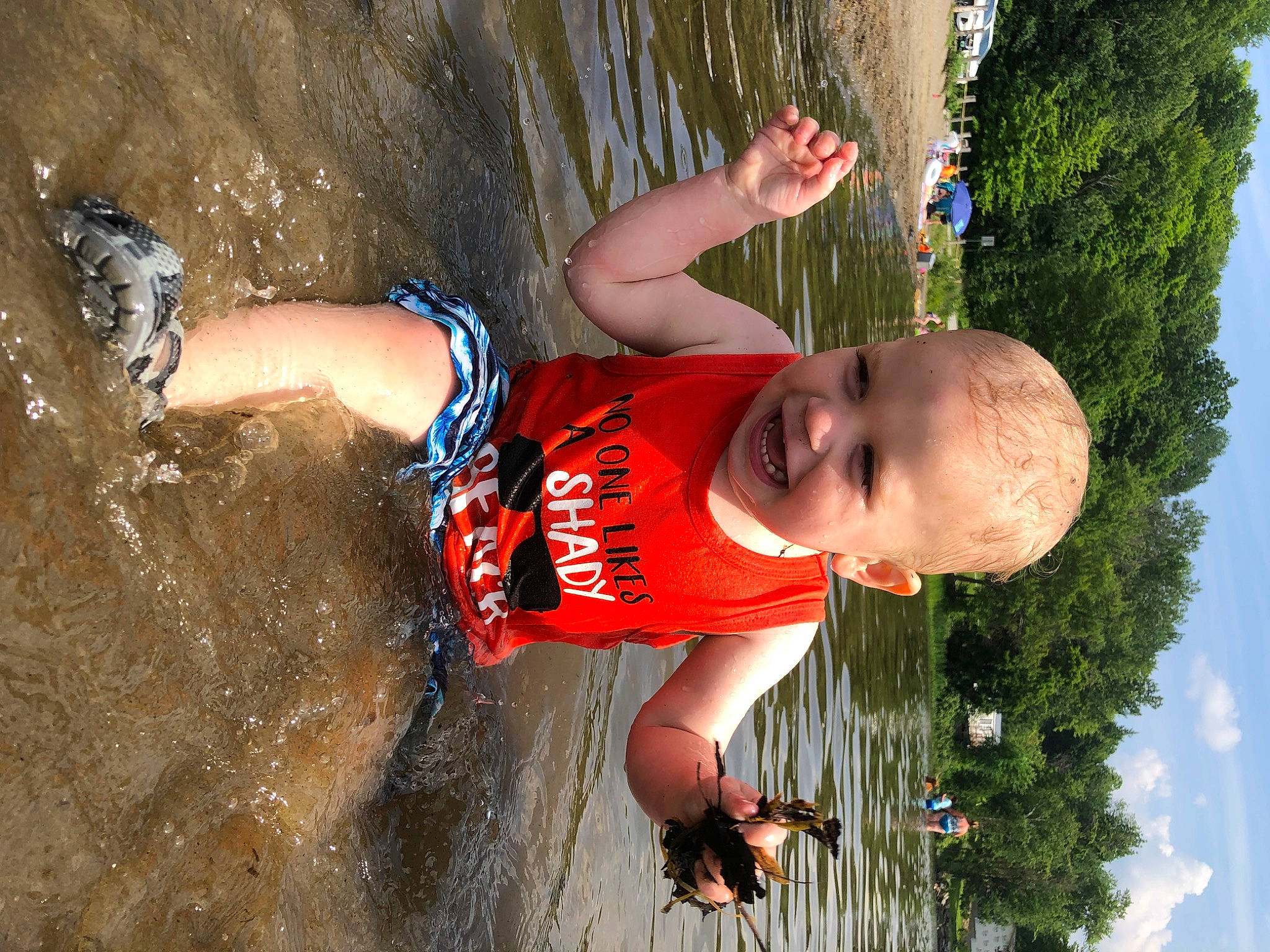 Landyn is registered to the contest to win money with this photo: arm, child, climbing, elbow, extreme_sport, fun, grass, happy, leisure, people_in_nature, person, recreation, rock_climbing_equipment, rope, shorts, sky, soil, sport_climbing, sports, tree