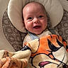 Milo joined the competition — help win amazing prizes! baby, infant, smile, blanket, tiger, tigger, baby_seat, cushion, happy, child, face, head, indoors, comfort, warm, cute, portrait, expression, young, cozy