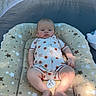baby, infant, romper, pacifier, cushion, stars, tent, outdoor, relaxing, child, pattern, fabric, footwearless, cute, sun_pattern, comfort, soft, head, face, skin