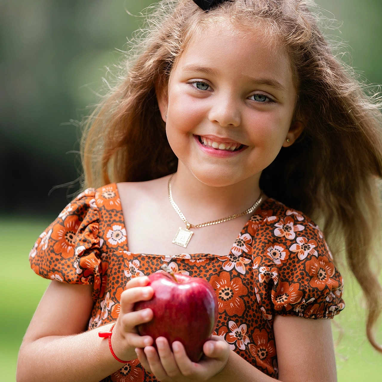 Alanys is registered to the contest to win money with this photo: accessories, apple, bodypart, child, face, female, finger, food, fruit, girl, happy, head, jewelry, necklace, person, photography, plant, portrait, produce, smile