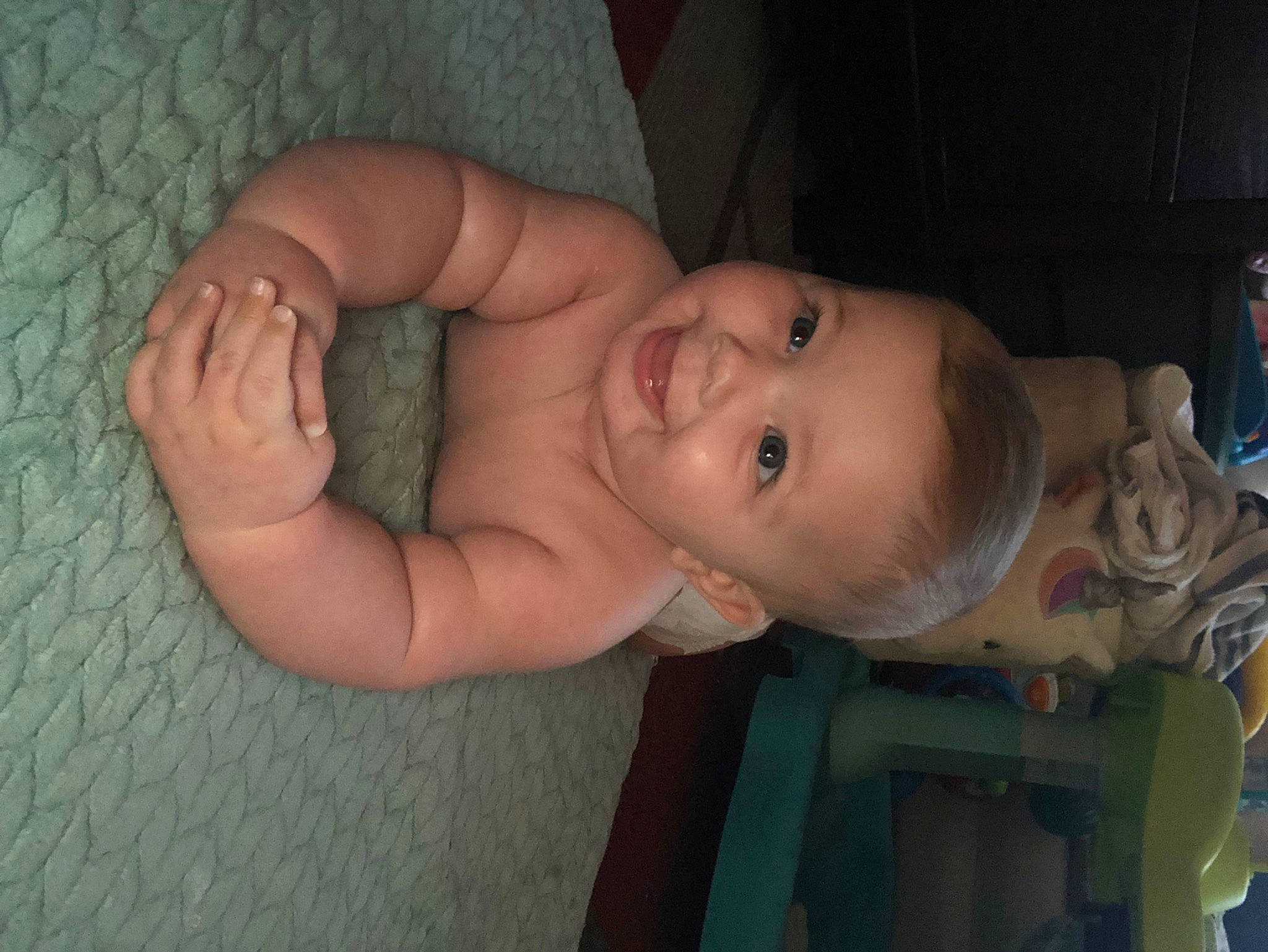 Kylin is registered to the contest to win money with this photo: arm, baby, baby_toddler_clothing, cheek, chin, ear, eye, eyebrow, finger, gesture, hand, human_body, iris, joy, lip, mammal, mouth, nose, person, skin