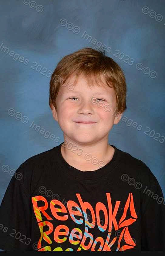 Bryson is registered to the contest to win money with this photo: active_shirt, cheek, child, chin, cool, electric_blue, eyebrow, flash_photography, font, forehead, fun, happy, iris, joy, logo, neck, person, portrait_photography, sleeve, smile