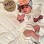 Aurorah joined the competition — help win amazing prizes! baby, newborn, girl, headband, flower, plaque, wood, blanket, white, clothing, onesie, socks, infant, cute, portrait, indoor, soft, milestone, month, laying