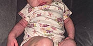 Aurorah joined the competition — help win amazing prizes! baby, infant, pink_bow, headband, onesie, floral_pattern, baby_seat, seat_belt, sleepy, cute, indoor, child, small_feet, relaxing, portrait, infant_clothing, baby_fashion, toddler, person, skin