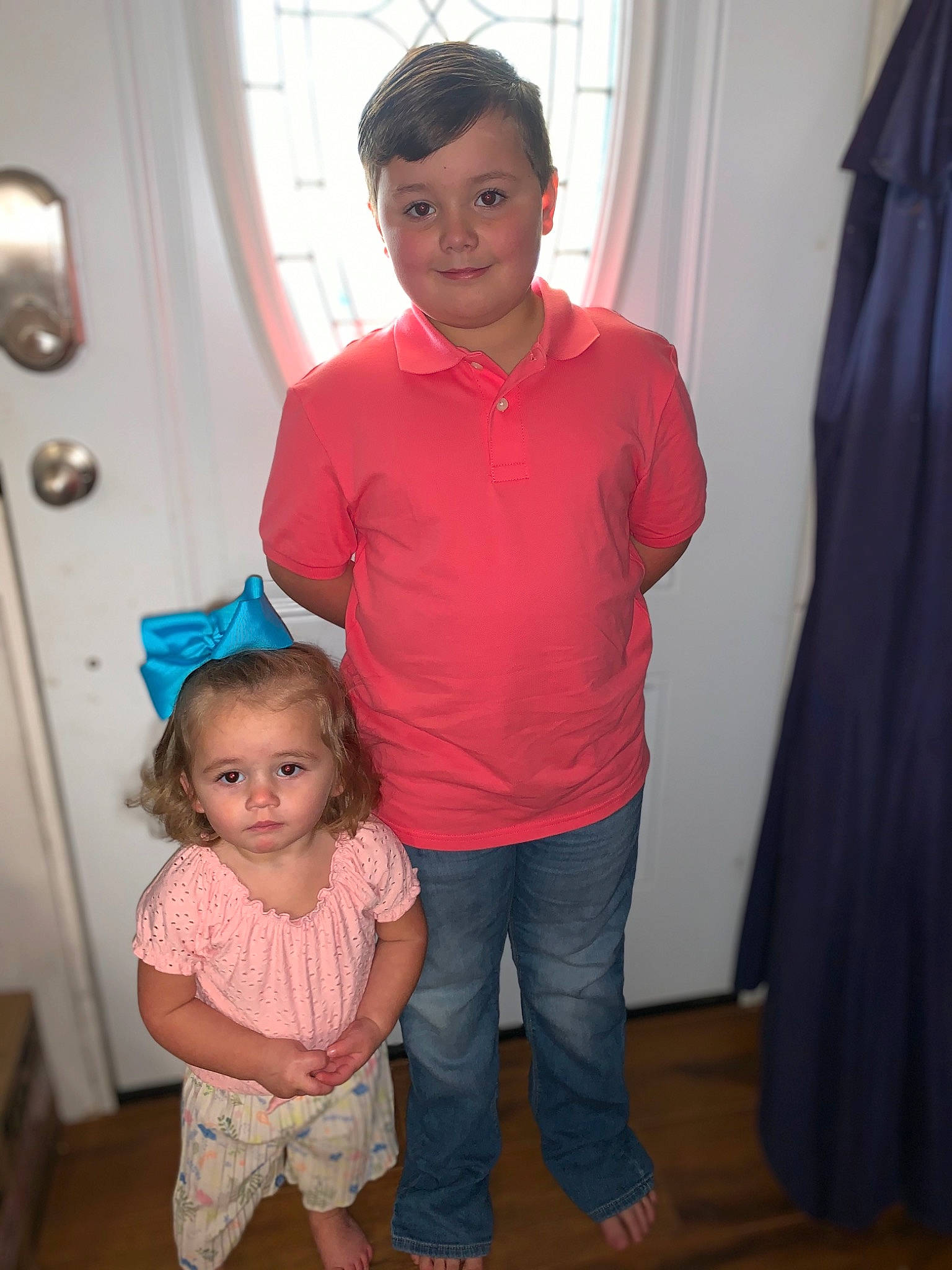 Brogan joined the competition — help win amazing prizes! child, family, fun, joy, people, person, pink, room, shoulder, smile, standing, t_shirt, toddler, vacation