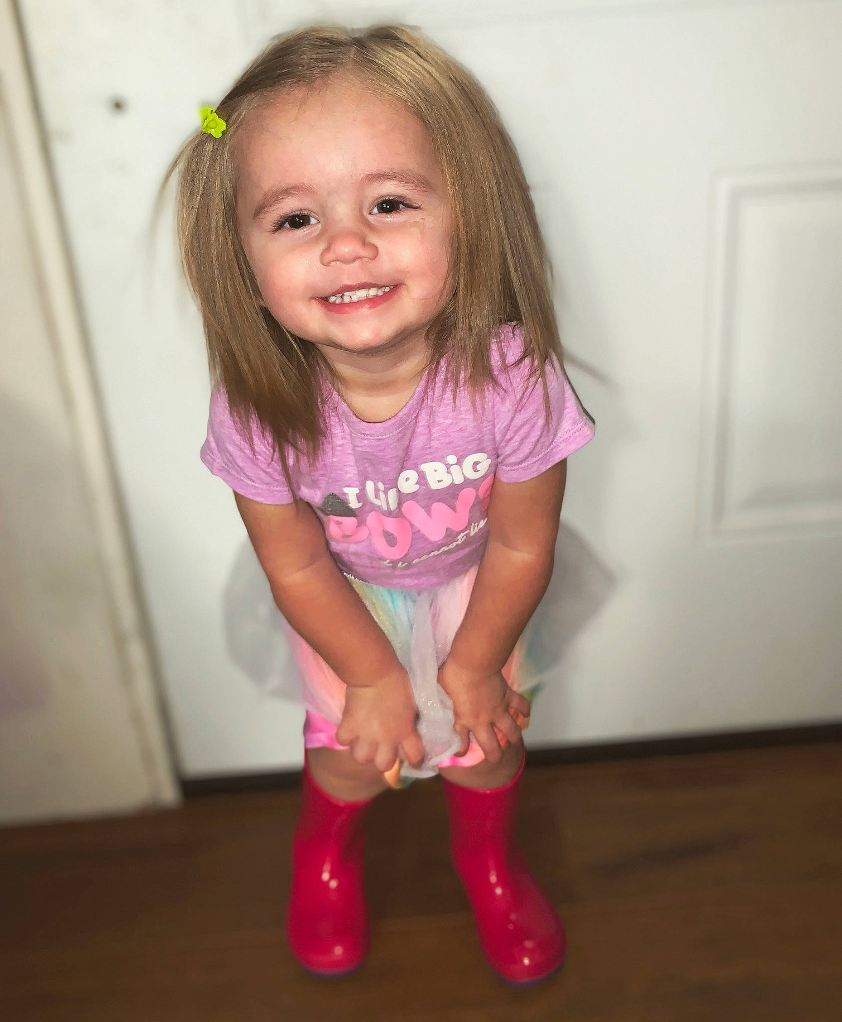 Kinleigh is registered to the contest to win money with this photo: blond, cheek, child, child_model, eye, face, footwear, hair, head, human_leg, iris, joint, joy, knee, leg, person, pink, shoe, skin, smile