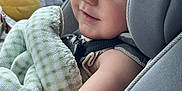 Arya is registered to the contest to win money with this photo: baby, child, car_seat, blanket, plush_toy, smiling, curly_hair, seatbelt, indoors, window, comfort, cute, infant, soft_toys, portrait, car_interior, child_safety, happy, closeup, relaxed