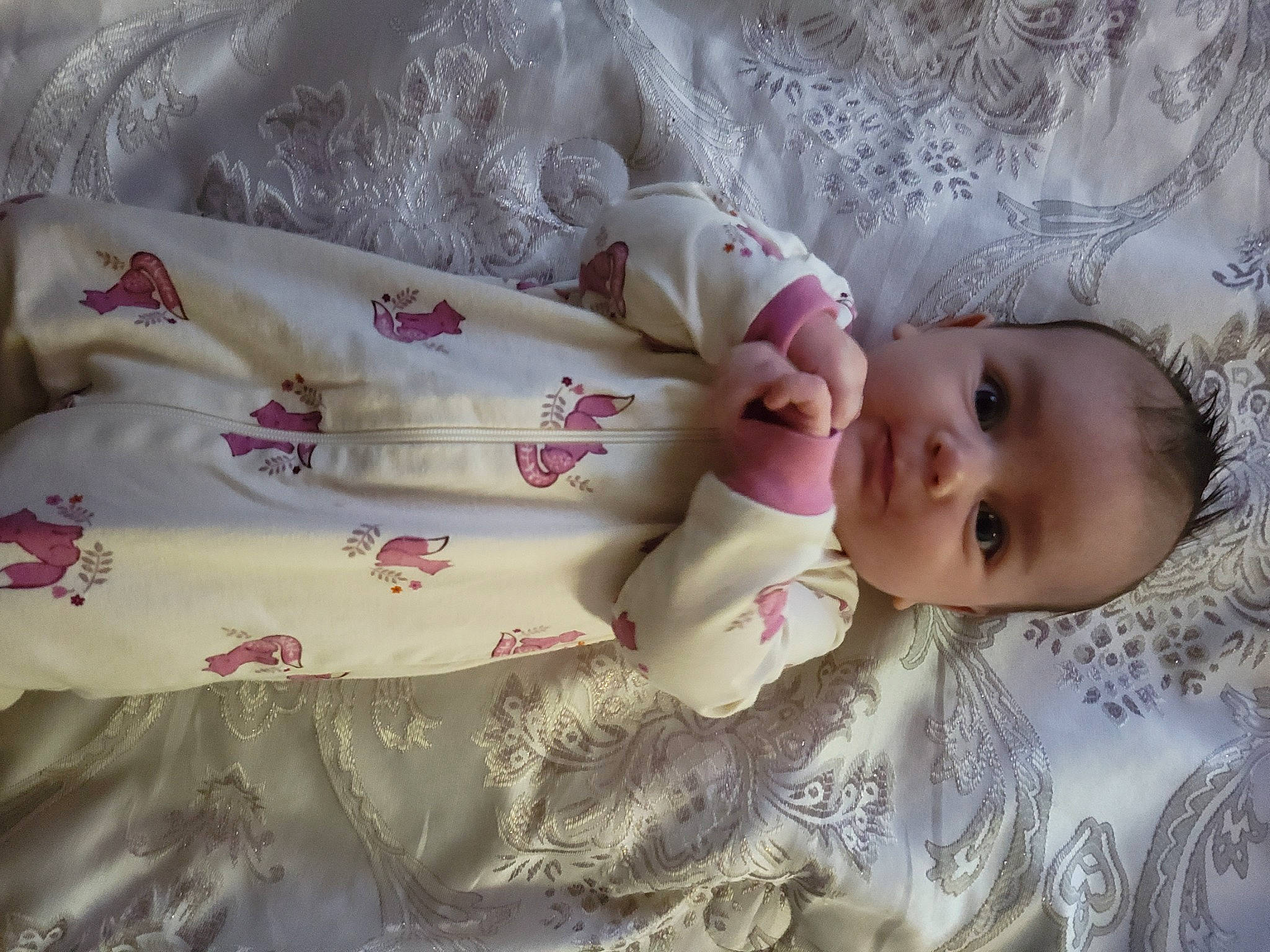 Eden joined the competition — help win amazing prizes! baby, baby_toddler_clothing, bedding, child, clothing, comfort, doll, dress, embellishment, eyelash, hand, head, linens, pattern, person, product, room, skin, sleeve, textile