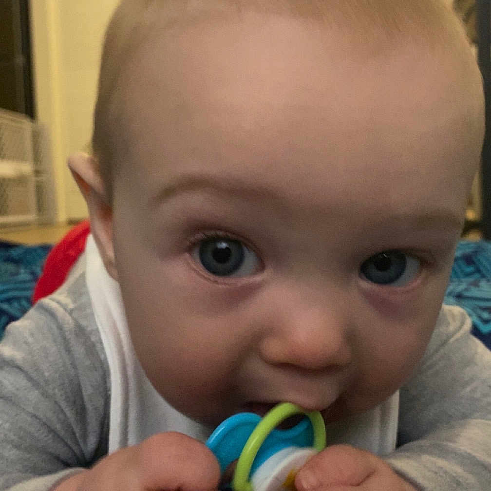 Hudson joined the competition — help win amazing prizes! baby, bodypart, clothing, couch, cutlery, face, finger, food, furniture, hand, head, indoors, newborn, person, photography, portrait, quilt, spoon, sweets, t_shirt