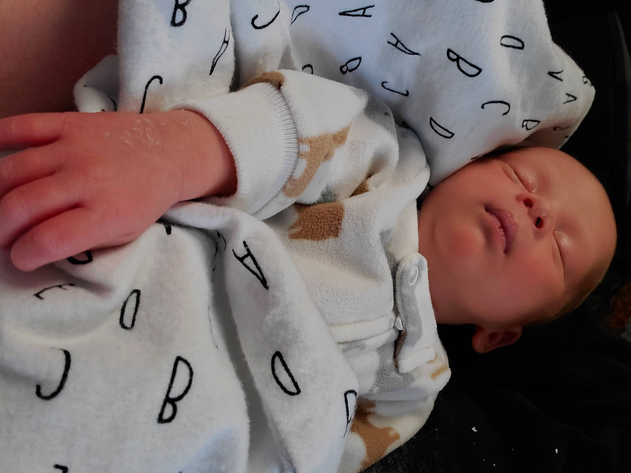 Daxton joined the competition — help win amazing prizes! baby, baby_products, baby_sleeping, birth, cheek, child, finger, gesture, hand, person, product, toddler