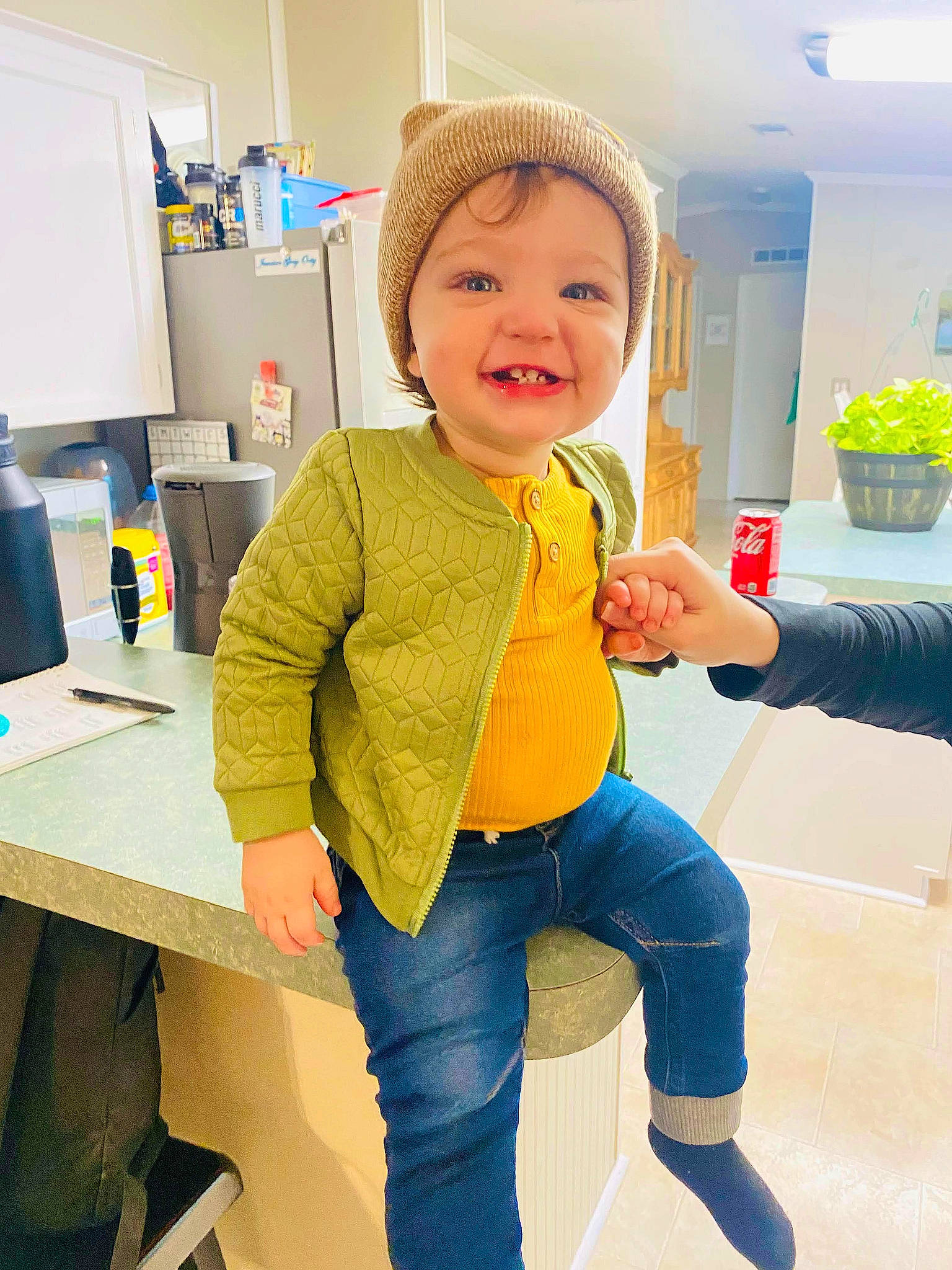 Jameson joined the competition — help win amazing prizes! baby, baby_toddler_clothing, child, denim, desk, electric_blue, flooring, flowerpot, fun, happy, houseplant, human_leg, joy, peripheral, person, plant, room, sleeve, smile, table