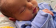 Haisley joined the competition — help win amazing prizes! baby, newborn, sleeping, pajamas, blanket, cozy, infant, soft, cute, peaceful, child, indoors, face, hand, head, person, rest, clothing, bedroom, comfort