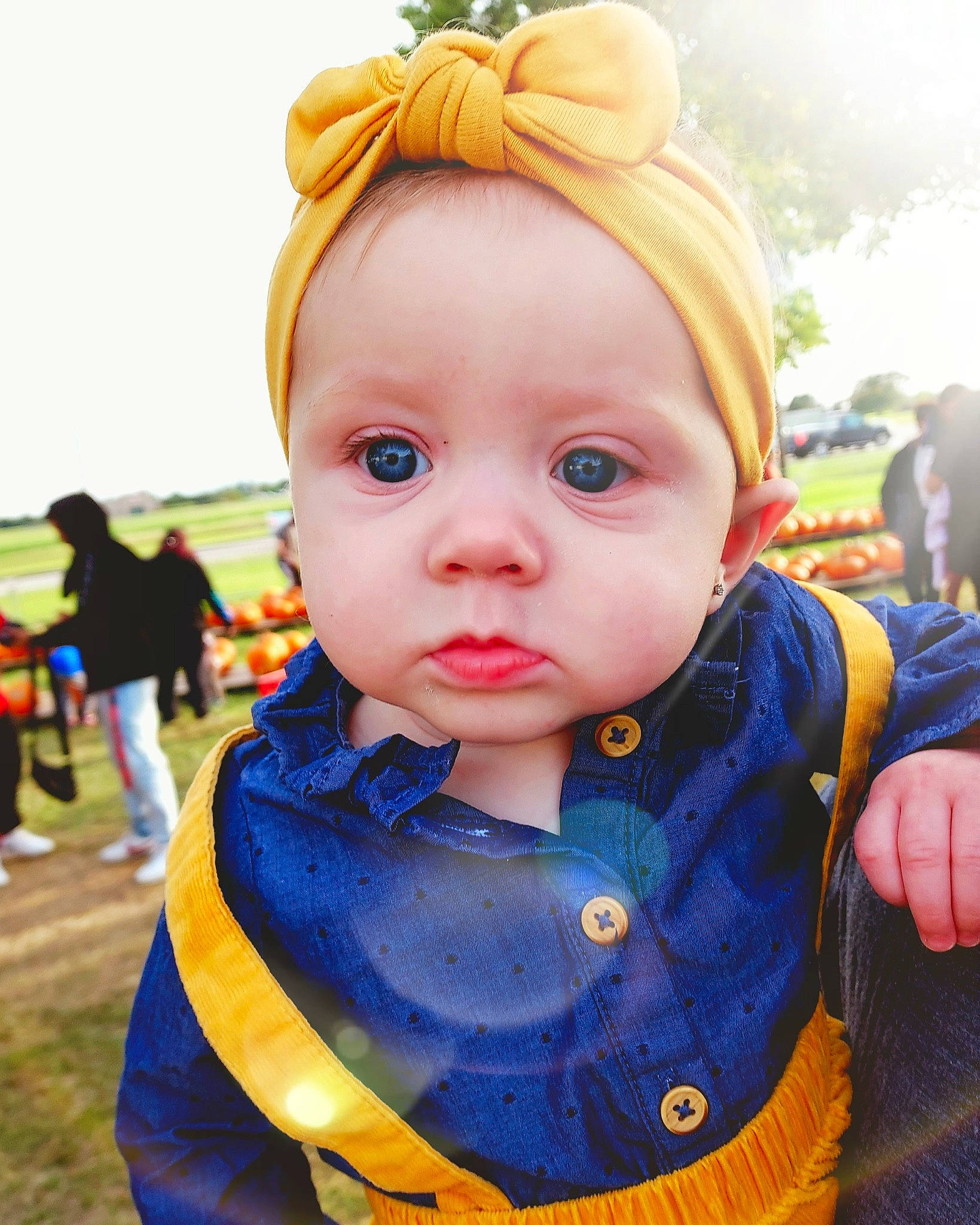 Aiyana is registered to the contest to win money with this photo: baby, baby_toddler_clothing, cap, cheek, child, clothing, electric_blue, grass, happy, hat, iris, lip, nose, person, plant, skin, sky, sleeve, street_fashion, toddler