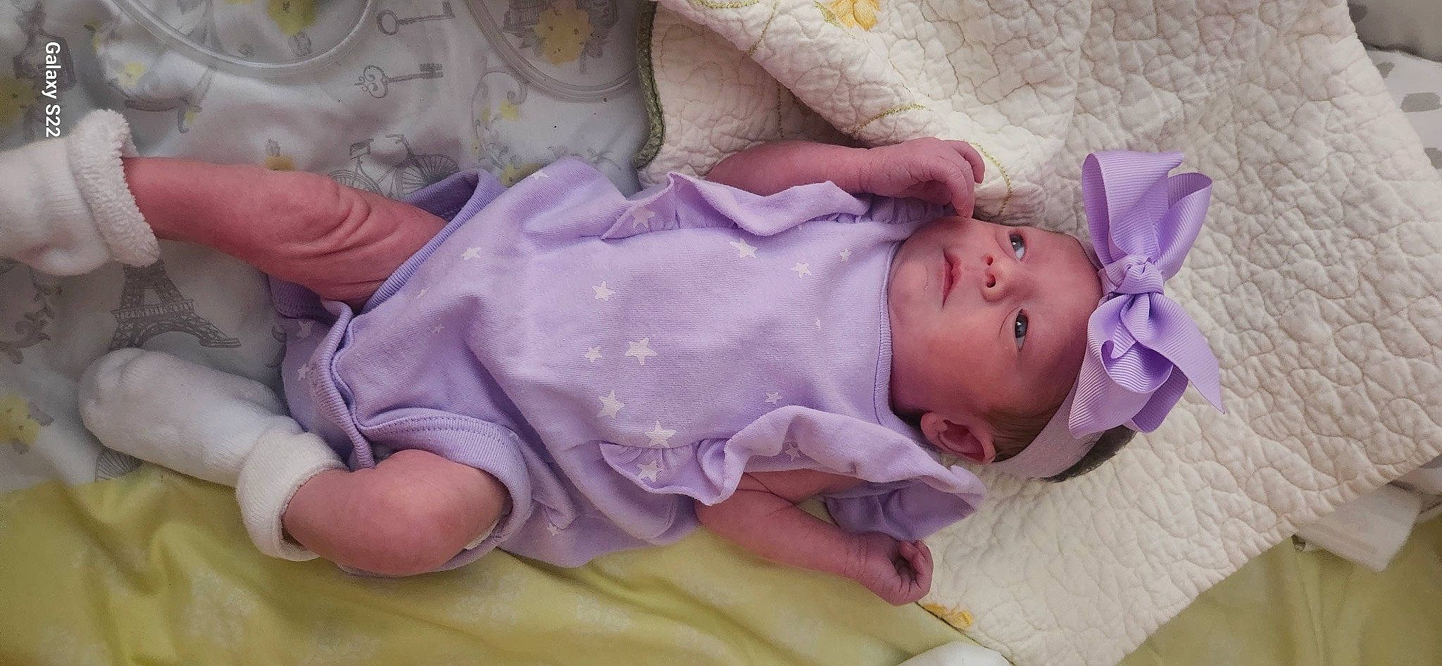 Arabella joined the competition — help win amazing prizes! baby, baby_products, baby_safety, baby_sleeping, baby_toddler_clothing, bedding, bedtime, cheek, child, comfort, finger, hand, head, headwear, linens, person, pink, purple, room, skin