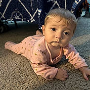 Arabella is registered to the contest to win money with this photo: baby, babycrawling, blanket, blonde, bodypart, clothing, costume, crawling, dress, face, finger, hair, hand, head, person, photography, portrait, sitting