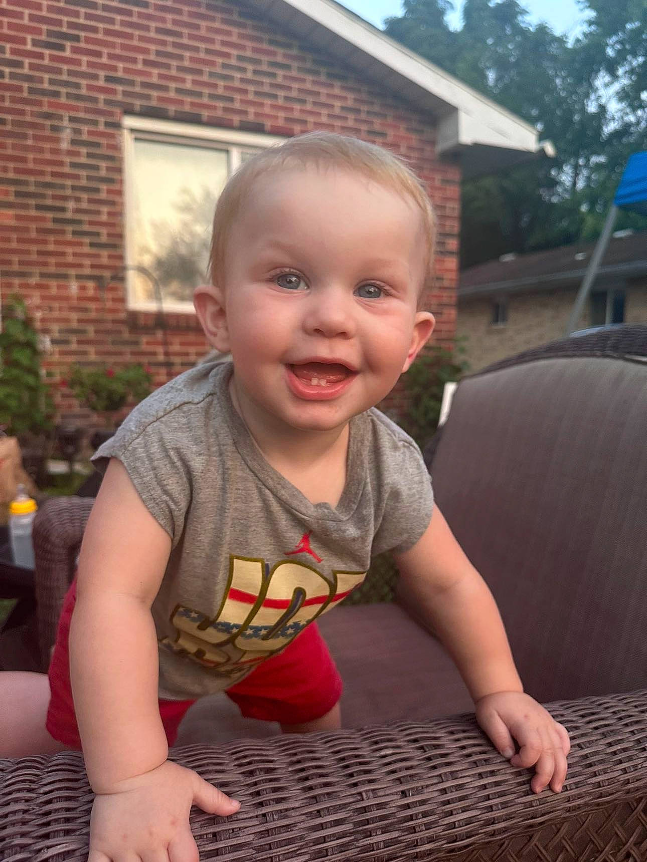 Jaylin joined the competition — help win amazing prizes! baby, baby_toddler_clothing, child, chin, flooring, fun, grass, happy, joy, leisure, mouth, nose, person, plant, sitting, skin, smile, t_shirt, toddler, tree