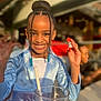 Emila a rejoint le concours — aidez-le/la à gagner de superbes lots ! child, girl, smiling, braided_hair, blue_dress, candy, drink, glass, straw, outdoor, daylight, happy, portrait, person, fashion, table, background_blur, cute, celebration, fun