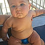 baby, child, infant, skin, outdoor, fence, diaper, person, chubby, legs, arms, face, expression, holding, sunlight, shadow, blue, pattern, sitting, closeup