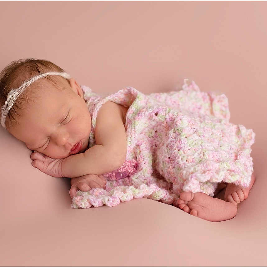 Chelsea joined the competition — help win amazing prizes! accessories, baby, blanket, bodypart, bonnet, clothing, dress, face, finger, glove, hand, happy, hat, head, headband, jewelry, newborn, person, photography, portrait