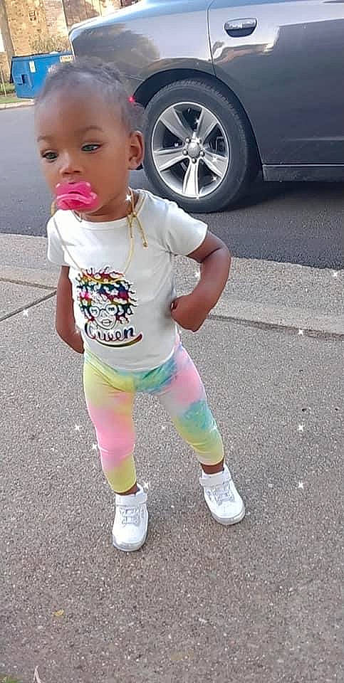 Courtnie is registered to the contest to win money with this photo: asphalt, automotive_design, automotive_exterior, automotive_lighting, automotive_tire, baby_toddler_clothing, car, face, fender, hubcap, motor_vehicle, person, personal_luxury_car, sleeve, sneakers, t_shirt, tire, toddler, vehicle_door, wheel