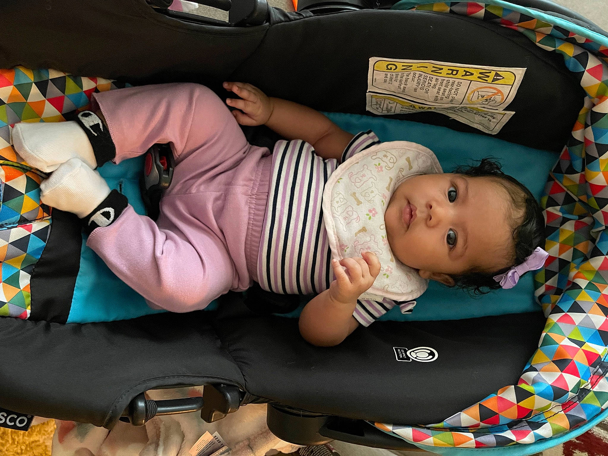 Skyelar is registered to the contest to win money with this photo: abdomen, arm, baby, baby_carriage, baby_products, baby_toddler_clothing, car_seat, child, comfort, hat, human_leg, lap, pattern, person, product, room, sitting, thigh, toddler