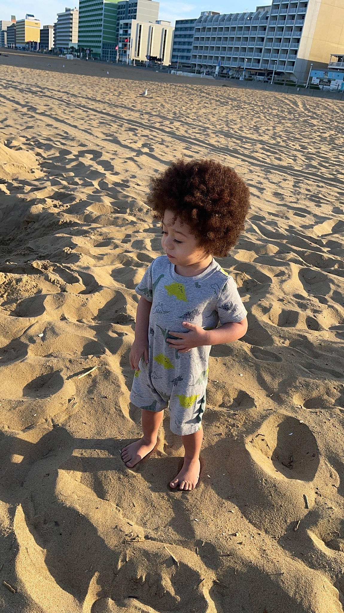 Brandon joined the competition — help win amazing prizes! barefoot, beach, body_of_water, child, fun, horizon, landscape, ocean, people_in_nature, people_on_beach, person, play, sand, shadow, shorts, soil, t_shirt, tints_and_shades, toddler, travel