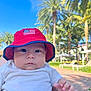 baby, baseballcap, bodypart, cap, clothing, face, finger, grass, hand, hat, head, palmtree, person, photography, plant, portrait, summer, sunhat, tree, vegetation
