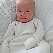 Bentley joined the competition — help win amazing prizes! baby, bed, blanket, clothing, cushion, face, furniture, happy, head, homedecor, linen, longsleeve, newborn, pants, person, photography, portrait, quilt, sleeve, smile