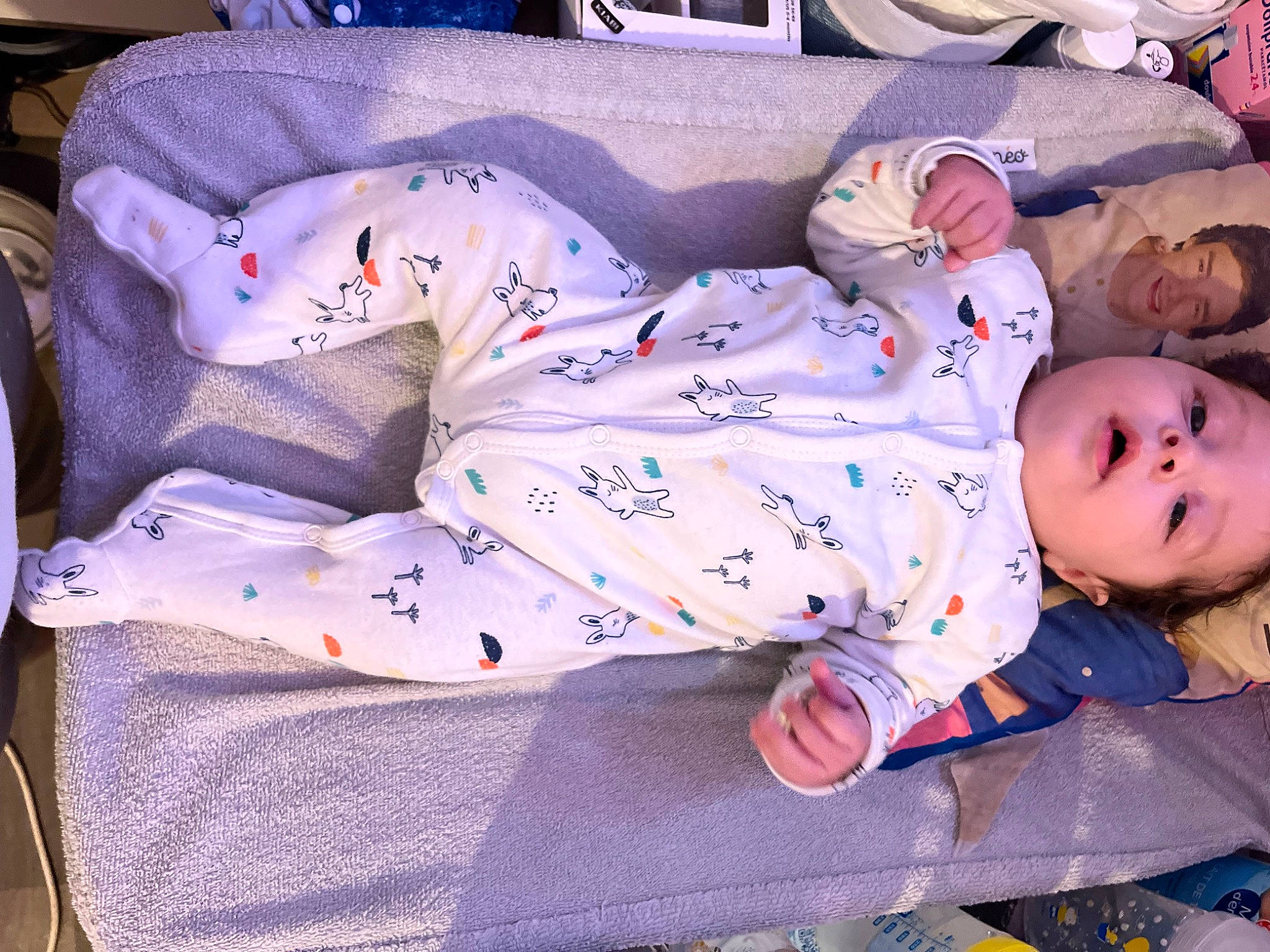 Kenzo participe au concours pour gagner de l'argent avec cette photo : baby, baby_products, baby_sleeping, baby_toddler_clothing, bedding, bedtime, child, comfort, flooring, joy, linens, nap, nightwear, pattern, person, purple, room, sitting, sleep, sleeve