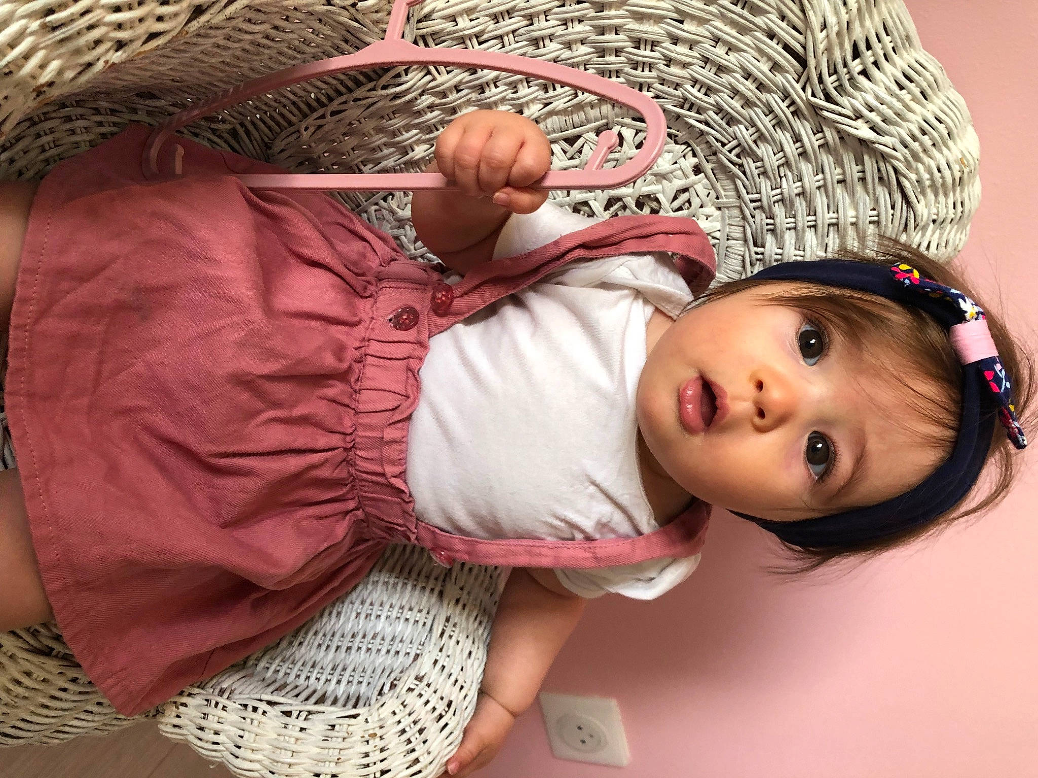 Emma participe au concours pour gagner de l'argent avec cette photo : baby, baby_toddler_clothing, cap, child, comfort, doll, eyelash, fashion_accessory, headgear, headpiece, knit_cap, linens, magenta, mouth, pattern, person, pink, sitting, skin, surprise