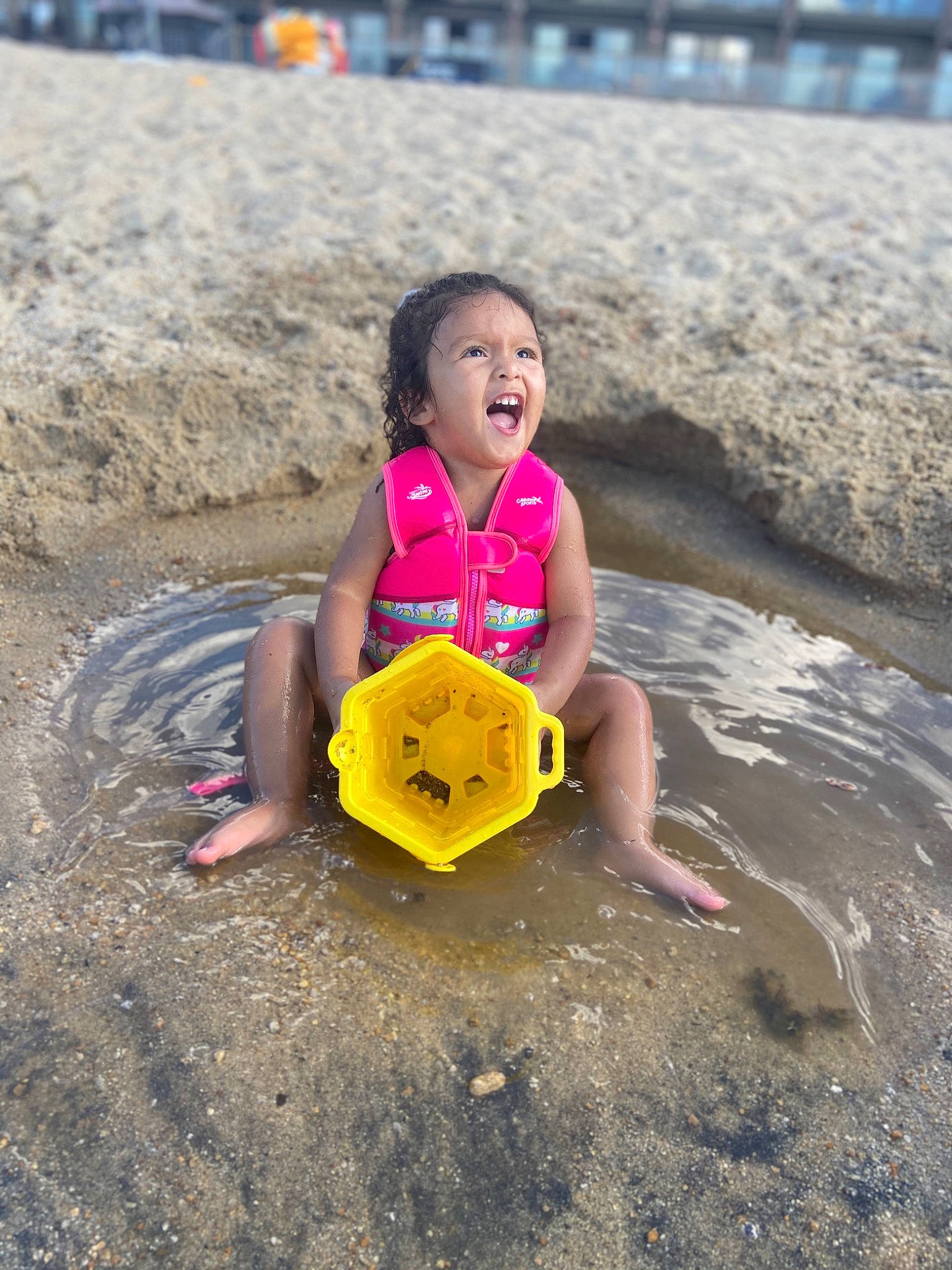 Brielle joined the competition — help win amazing prizes! beach, child, coast, fun, leisure, lifejacket, mud, person, play, recreation, sand, sea, smile, summer, vacation, vehicle, water