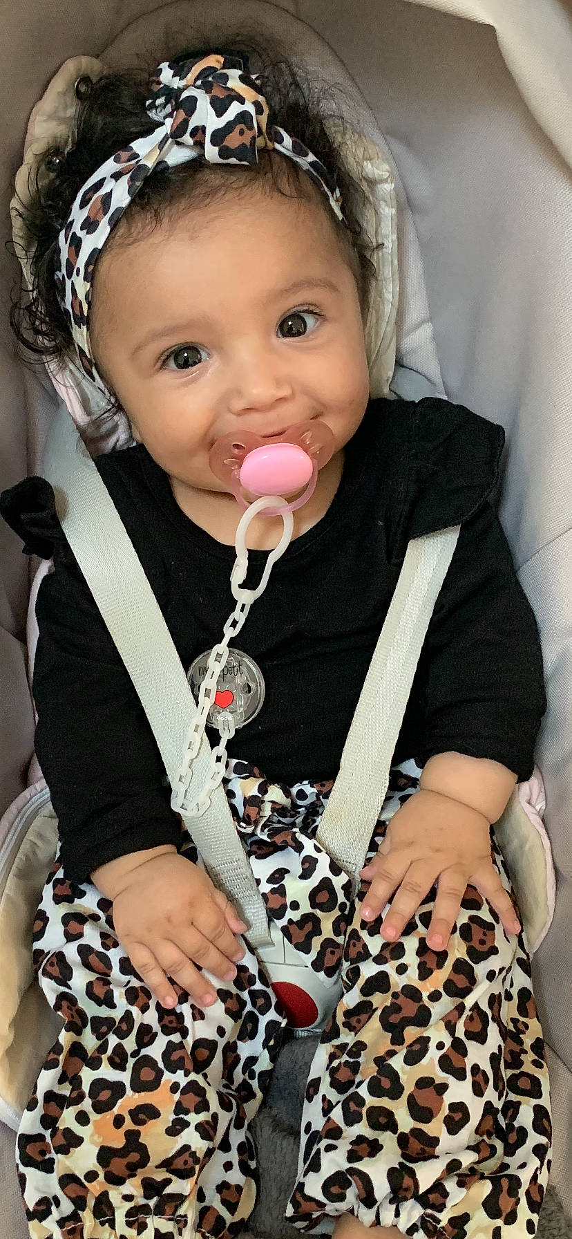 Déva participe au concours pour gagner de l'argent avec cette photo : baby_toddler_clothing, black, cheek, clothing, collar, cool, dress, eyelash, face, finger, head, lip, neck, outerwear, person, photograph, pink, skin, sleeve, toddler