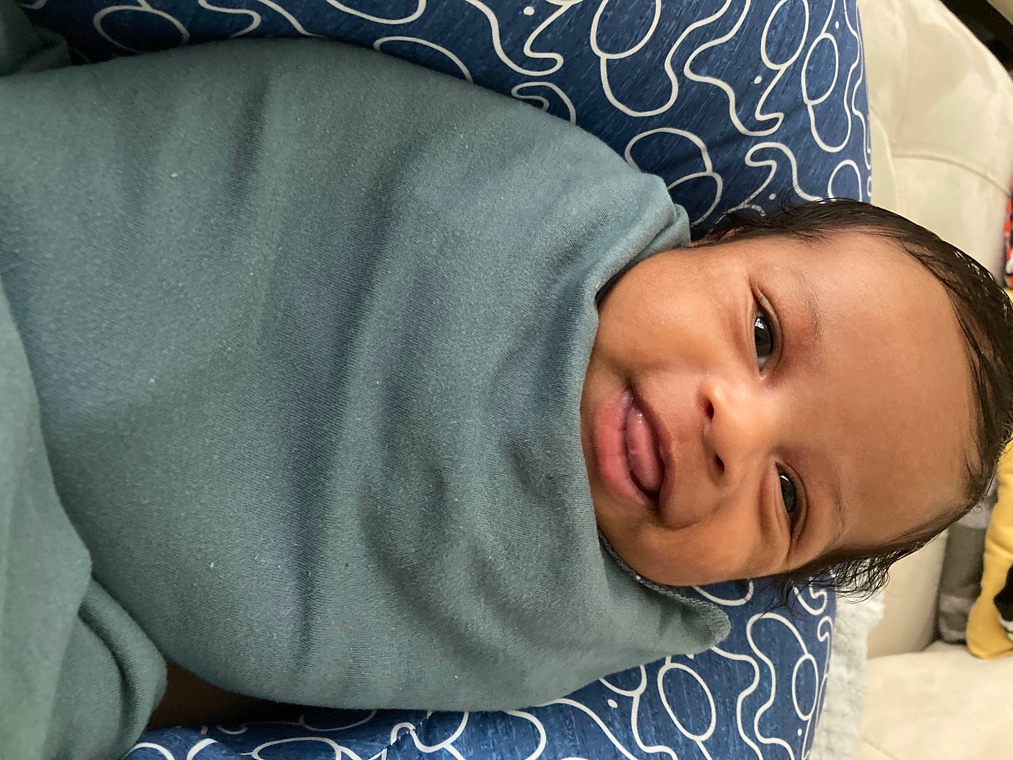 Elias joined the competition — help win amazing prizes! baby, baby_laughing, baby_toddler_clothing, blue, cap, child, comfort, eye, eyebrow, face, fashion_accessory, happy, linens, lip, nose, person, portrait_photography, sleeve, smile, toddler