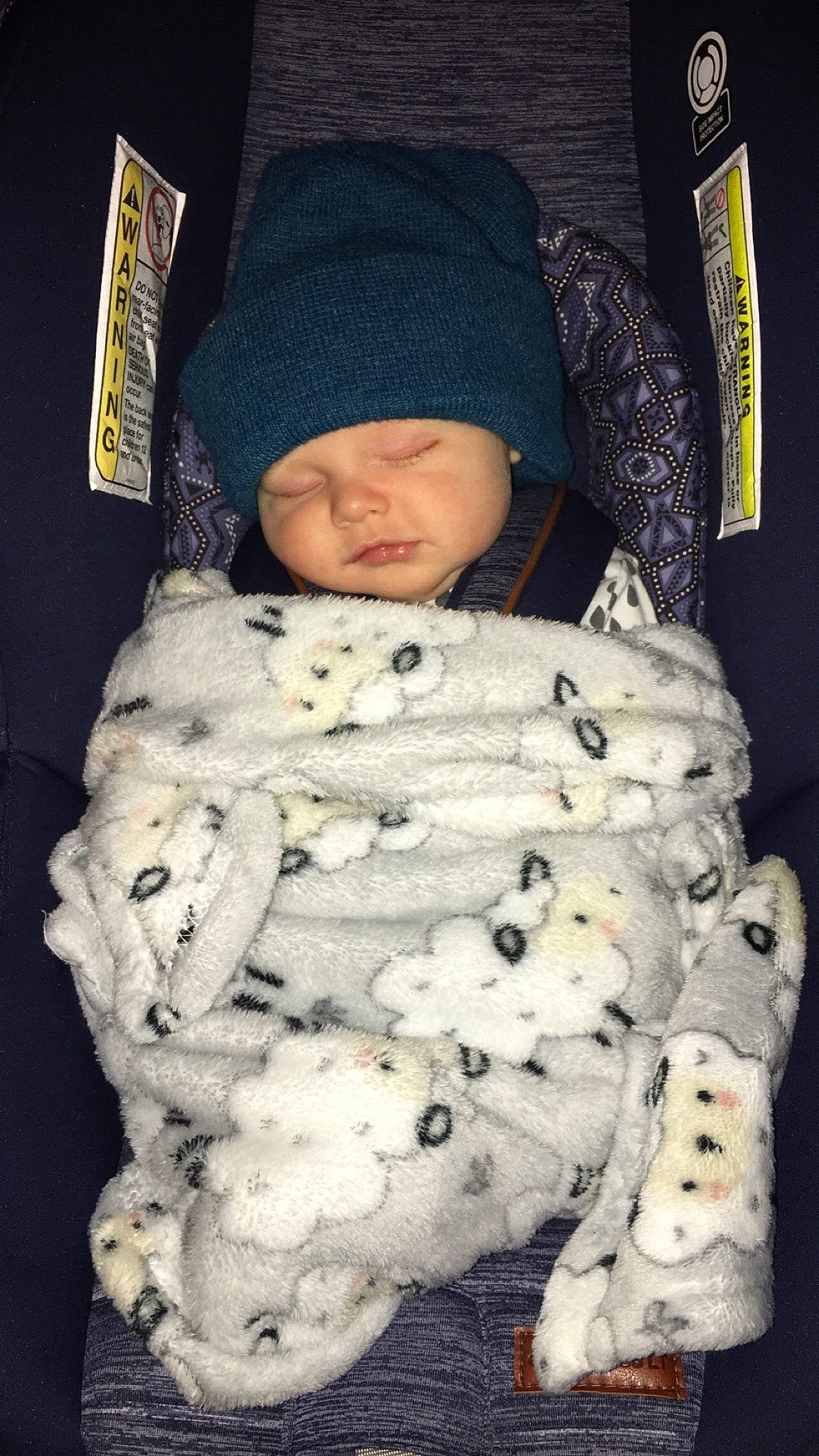Keegan joined the competition — help win amazing prizes! baby, baby_products, baby_safety, baby_sleeping, baby_toddler_clothing, beanie, cap, cheek, child, comfort, face, fur, headwear, knit_cap, linens, pattern, person, sitting, sleep, sleeve