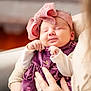 baby, infant, sleeping, headband, bow, purple_dress, hands, person, arm, cozy, smiling, cute, portrait, indoor, soft_light, closeup, newborn, child, holding, warm