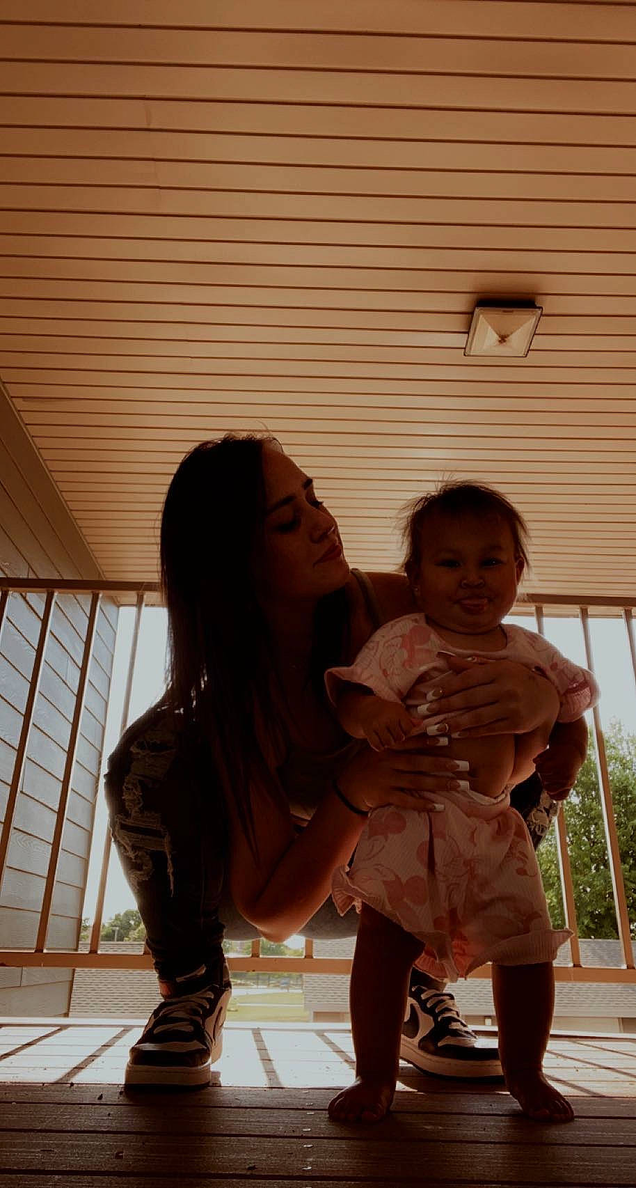 Winona is registered to the contest to win money with this photo: baby, child, flash_photography, flooring, foot, fun, happy, human_leg, interaction, joy, leisure, person, sandal, sitting, smile, sunlight, thigh, toddler, under_exposed, vacation