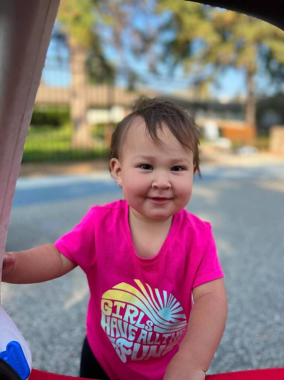 Winona is registered to the contest to win money with this photo: baby, baby_toddler_clothing, child, fun, grass, hairstyle, happy, joy, leisure, magenta, mammal, people, person, recreation, shoulder, skin, sleeve, smile, summer, toddler