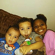 Jordan Brown joined the competition — help win amazing prizes! bottle, boy, casual, child, children, clothing, couch, cute, face, family, girl, happy, home, indoor, playful, portrait, sitting, smiling, toddler, together