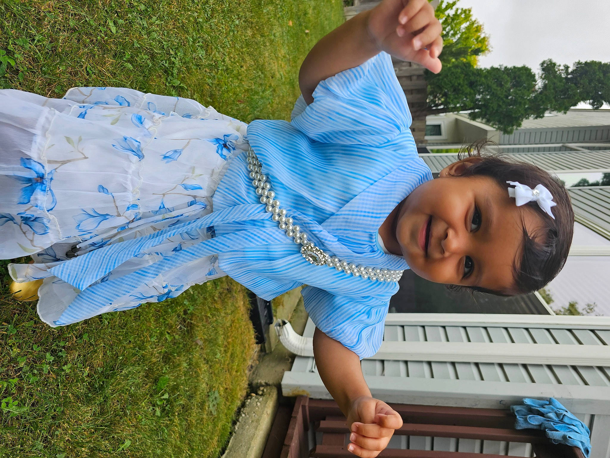 Sia is registered to the contest to win money with this photo: child, cool, denim, electric_blue, fun, grass, happy, joy, leisure, people_in_nature, person, recreation, sitting, smile, summer, t_shirt, toddler, travel, tree, vacation