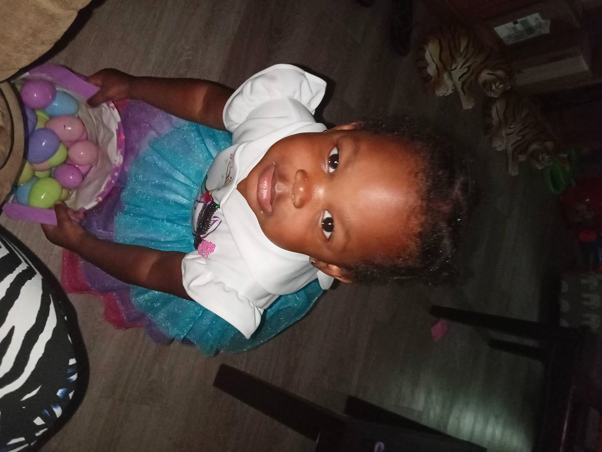 Masihi is registered to the contest to win money with this photo: baby, baby_products, baby_toddler_clothing, cheek, child, comfort, fun, hat, iris, mouth, person, room, sitting, skin, smile, tableware, toddler