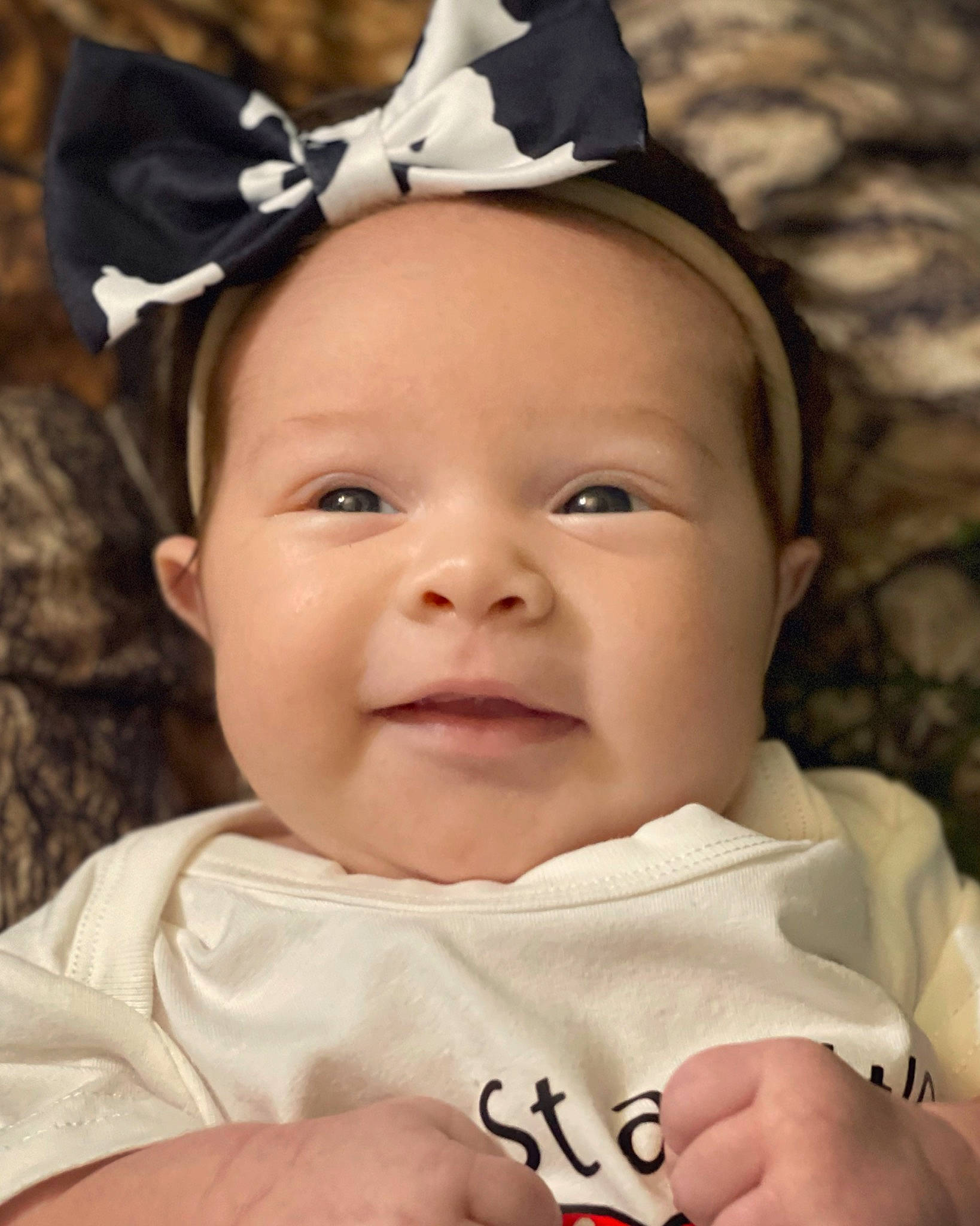 Callie joined the competition — help win amazing prizes! baby, cheek, chin, ear, eye, eyebrow, face, finger, gesture, happy, head, headwear, iris, lip, nose, person, product, skin, sleeve, smile