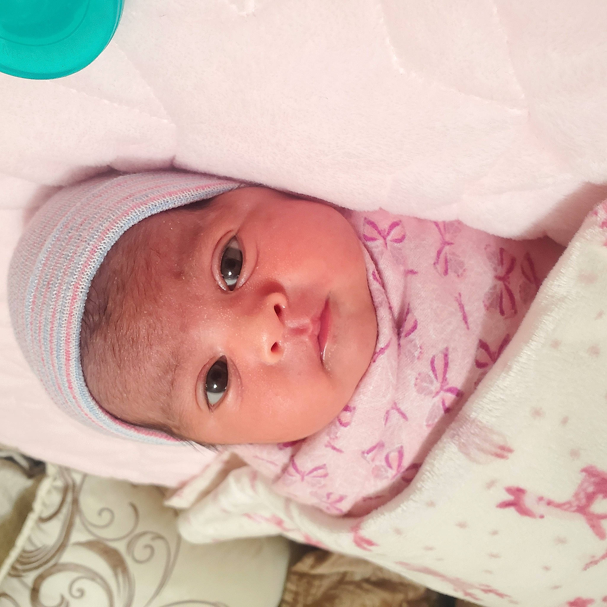 Aileen joined the competition — help win amazing prizes! baby, baby_toddler_clothing, cap, cheek, chin, comfort, eye, eyebrow, eyelash, face, hat, headgear, headwear, iris, linens, lip, nose, person, pink, skin