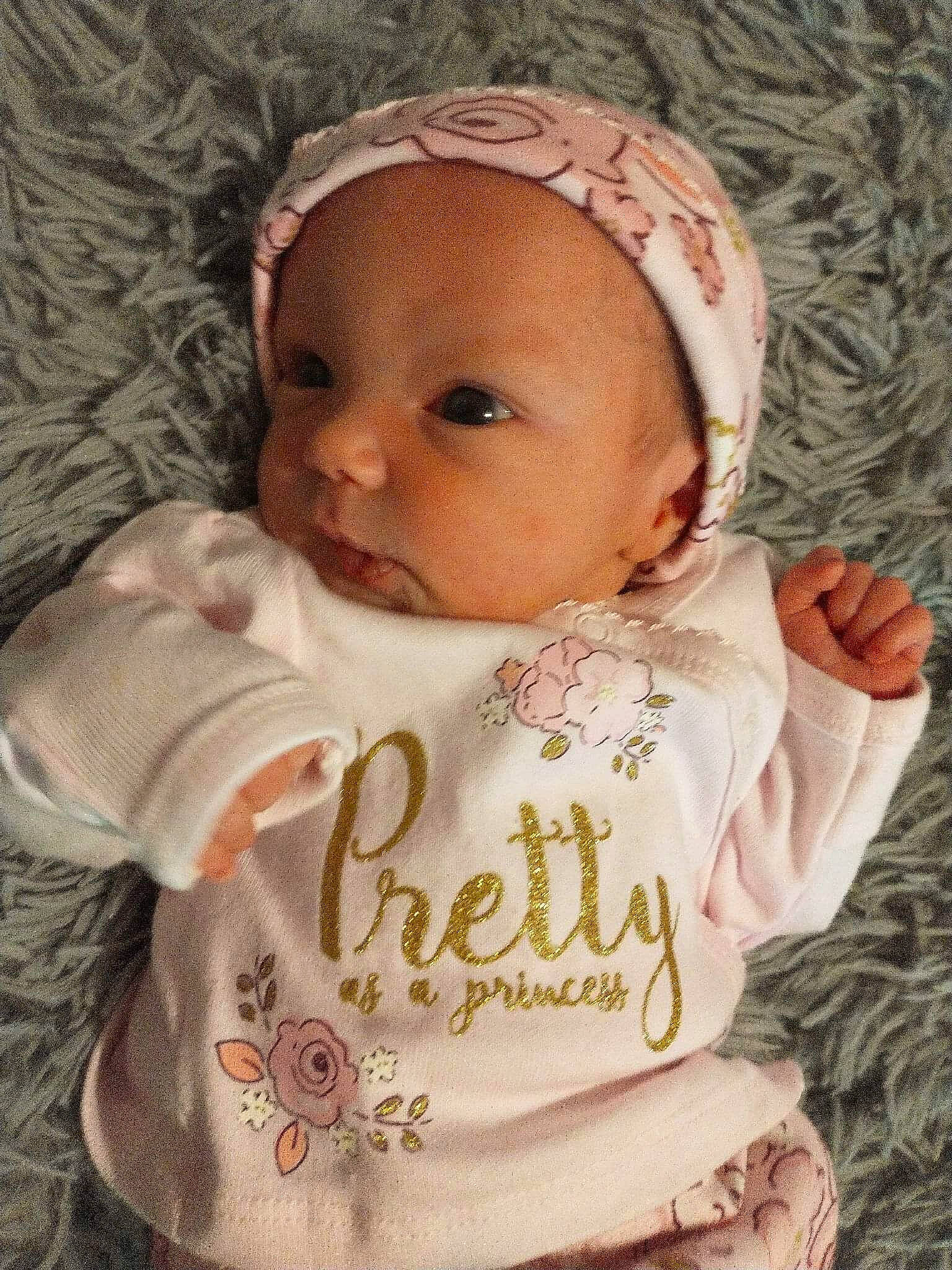 Karma joined the competition — help win amazing prizes! baby, baby_toddler_clothing, cap, cheek, chin, dress, eye, face, happy, hat, headgear, human_body, lip, nose, person, pink, product, skin, sleeve, textile